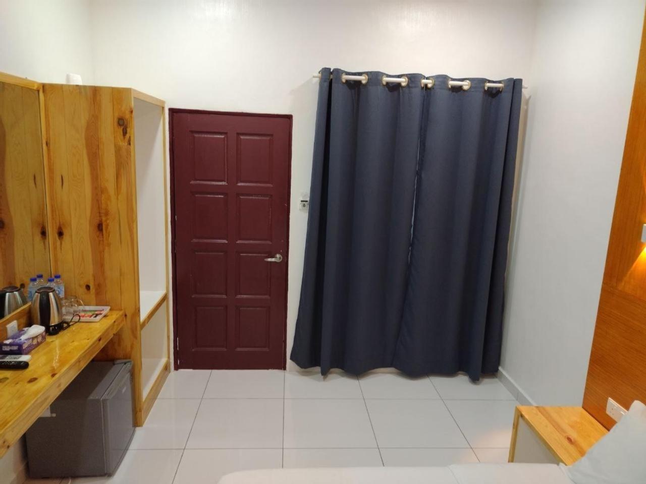 Motel Funduq Al Busyra à Pantai Cenang  Extérieur photo